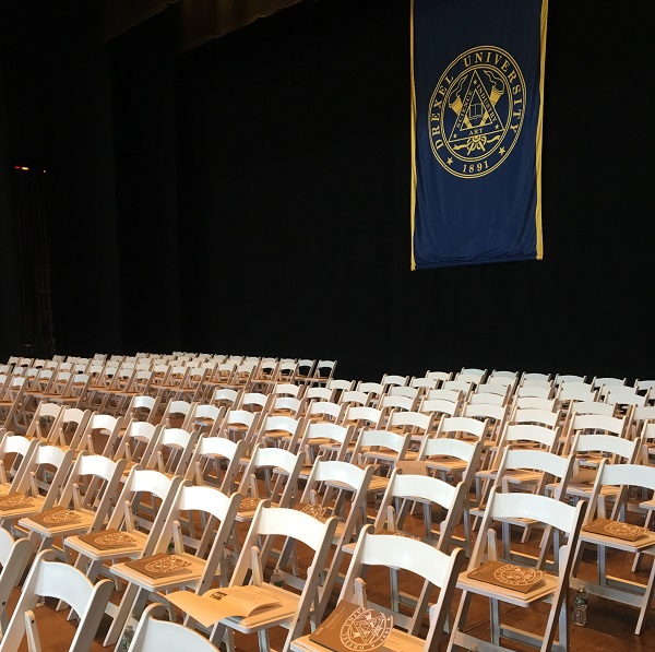 Empty chairs at the Mann Centere before commencement